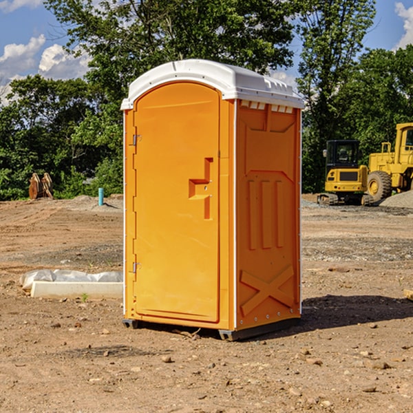 how often are the portable restrooms cleaned and serviced during a rental period in Ellis County